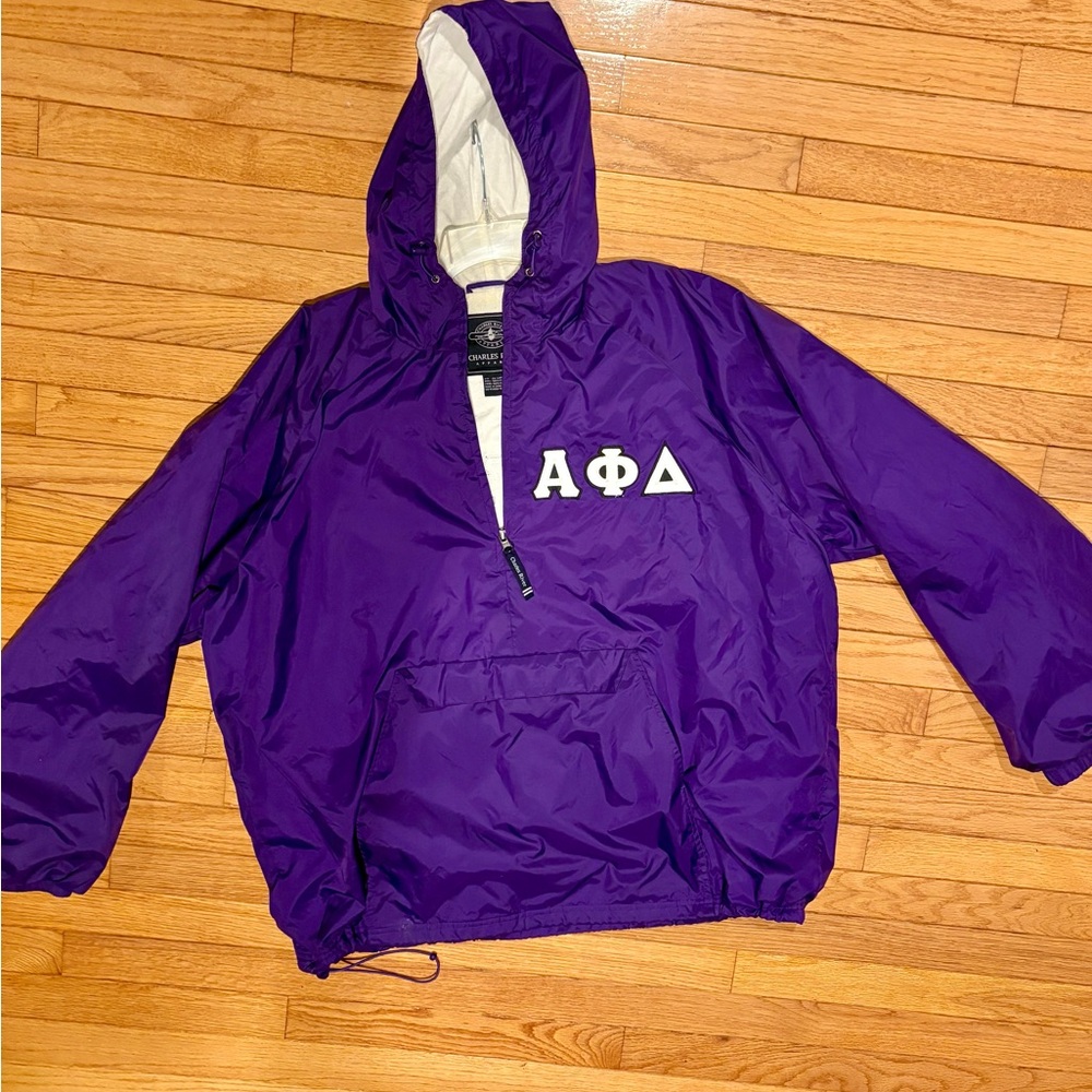 Alpha phi delta hooded lined windbreaker.  3/4 zip with front pocket